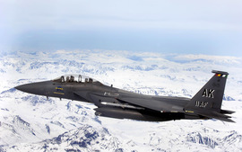 F 15e Strike Eagle Flys Over Glacial Fields