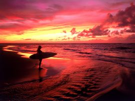 Surfer At Twilight Hawaii